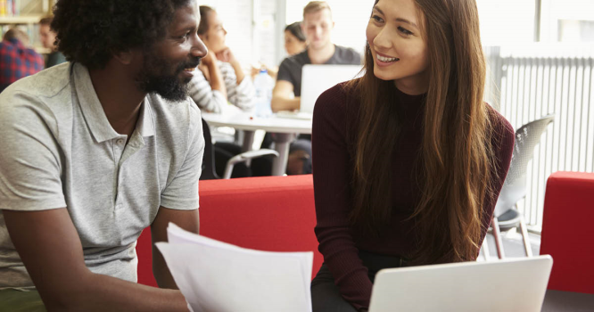Two coworkers talking